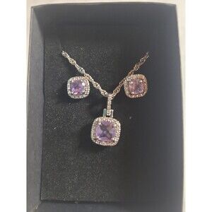 Silver tone necklace with matching earrings